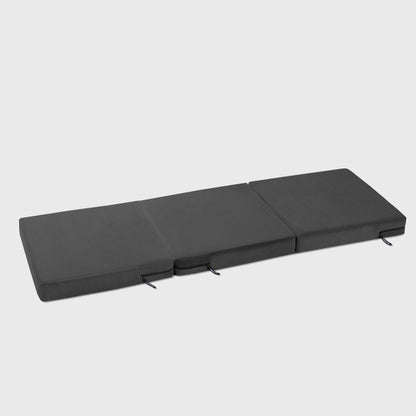 A black Center Stage ottoman, Bedroom Furniture by Liberator unfolded against a white background.