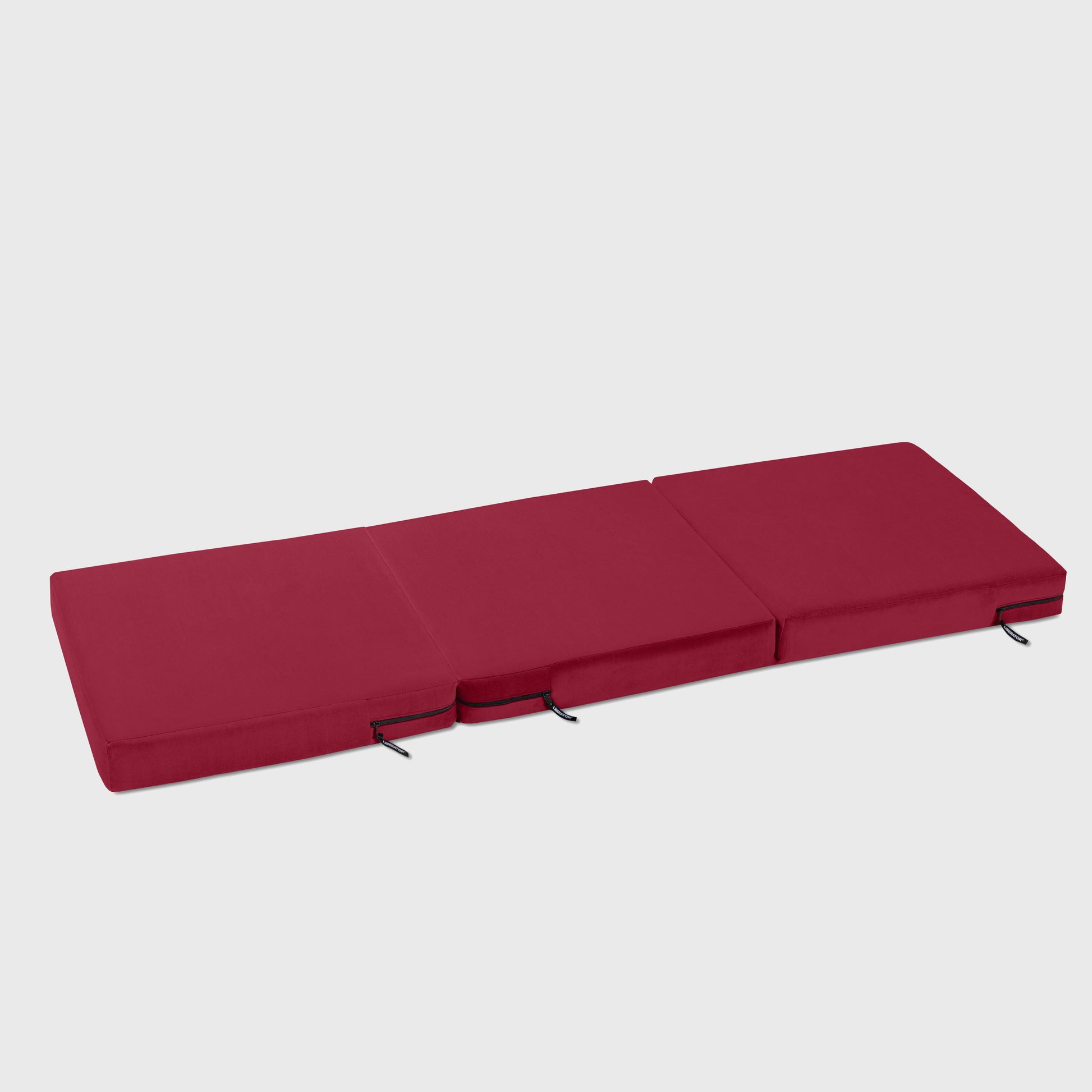 A merlot Center Stage ottoman, Bedroom Furniture by Liberator unfolded against a white background.