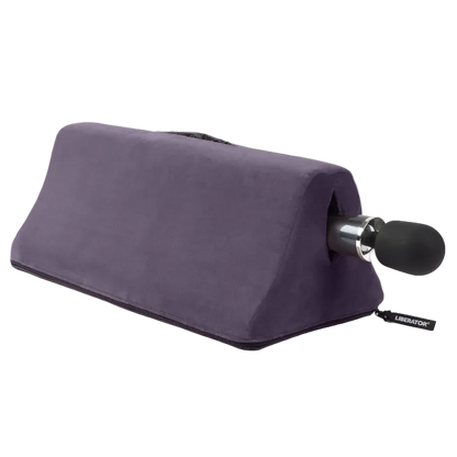 Aubergine Tula Toy Mount with wand vibrator by Liberator shown in purple microfiber. Compact shape designed for hands-free positioning and comfort.